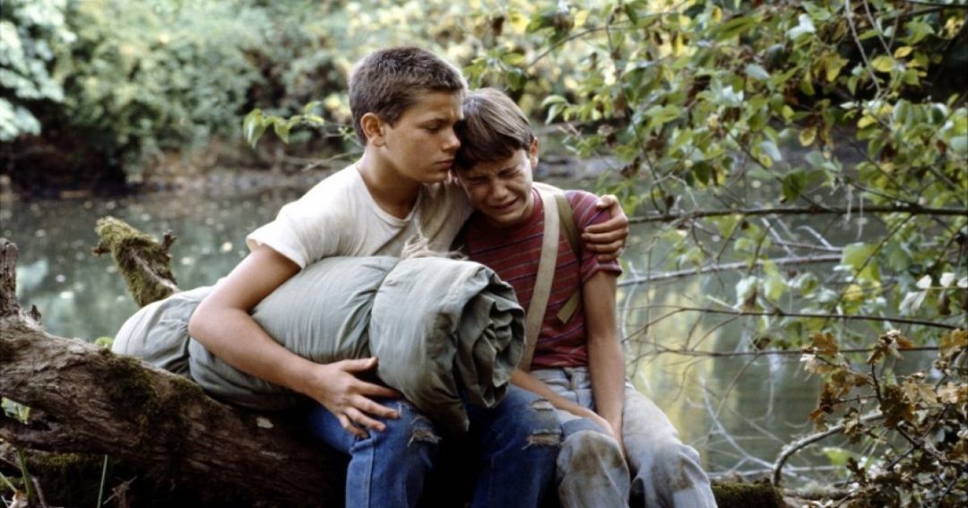 The four boys from Stand By Me walking along the railway tracks